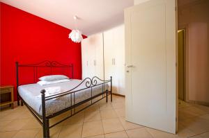 A bed or beds in a room at DANTE HOME