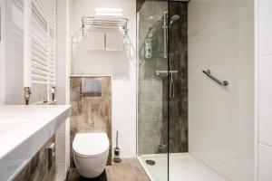 Een badkamer bij Hotel Hulst