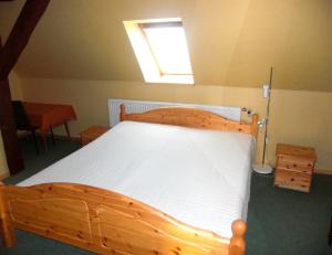 En eller flere senger på et rom på Wohnung in Ulrichshusen
