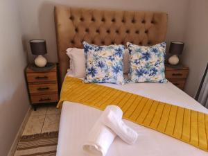 Postel nebo postele na pokoji v ubytování Makati Thata Comfort B&B