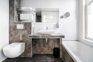 Een badkamer bij Hotel Hulst