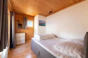 En eller flere senger på et rom på Chalet des Aravis - Appt 7 voyageurs