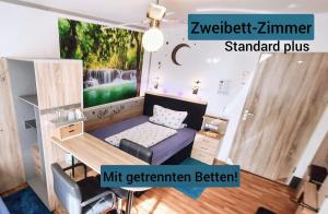 Postel nebo postele na pokoji v ubytování Hotel Garni Rodenbach
