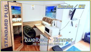 TV a/nebo společenská místnost v ubytování Hotel Garni Rodenbach