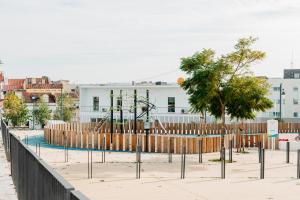 a playground in the middle of a city at Belém Tejo - Memória by Local in Lisbon