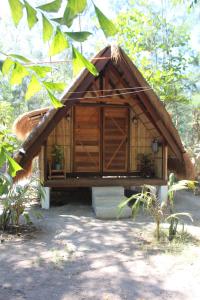 San FelipeにあるRiverback Sanctuaryの茅葺き屋根の小屋