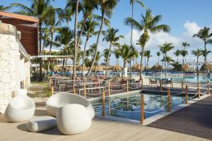 Blick auf den Pool im Resort in der Unterkunft Bahia Principe Grand Turquesa - All Inclusive in Punta Cana