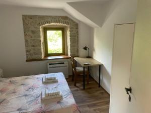 Postel nebo postele na pokoji v ubytování Apartment Makjanić