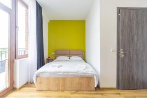 Postel nebo postele na pokoji v ubytování Hotel mia Telavi