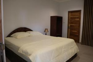 Katil atau katil-katil dalam bilik di Mesari Cottage Guest House