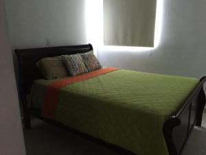 Postel nebo postele na pokoji v ubytování Napa Village Playa Blanca Resort