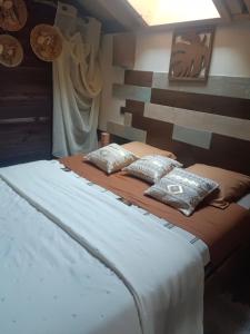 Postel nebo postele na pokoji v ubytování Chalet des secrets
