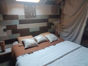 Postel nebo postele na pokoji v ubytování Chalet des secrets