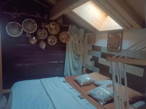 Postel nebo postele na pokoji v ubytování Chalet des secrets