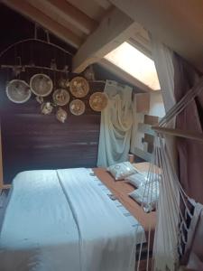 Postel nebo postele na pokoji v ubytování Chalet des secrets