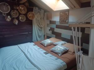 Postel nebo postele na pokoji v ubytování Chalet des secrets