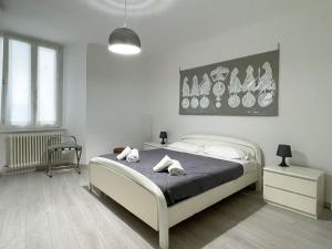Posteľ alebo postele v izbe v ubytovaní Paloma center town apartment