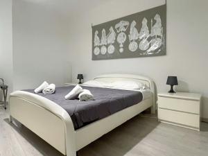 Posteľ alebo postele v izbe v ubytovaní Paloma center town apartment
