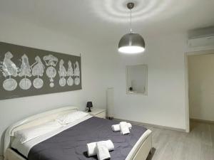Posteľ alebo postele v izbe v ubytovaní Paloma center town apartment