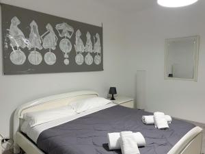 Posteľ alebo postele v izbe v ubytovaní Paloma center town apartment