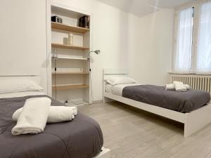 Posteľ alebo postele v izbe v ubytovaní Paloma center town apartment