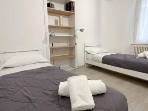 Posteľ alebo postele v izbe v ubytovaní Paloma center town apartment