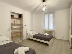 Posteľ alebo postele v izbe v ubytovaní Paloma center town apartment