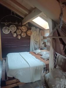 Postel nebo postele na pokoji v ubytování Chalet des secrets