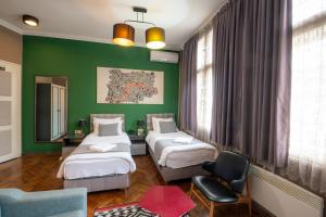 Postel nebo postele na pokoji v ubytování Hotel London B&B + 37 fotografií