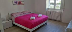 Postel nebo postele na pokoji v ubytování Pescara Relax