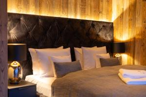 Posteľ alebo postele v izbe v ubytovaní Hotel Meta Resort & Vine SPA