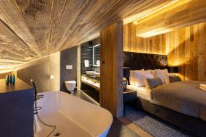 Posteľ alebo postele v izbe v ubytovaní Hotel Meta Resort & Vine SPA