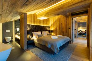 Posteľ alebo postele v izbe v ubytovaní Hotel Meta Resort & Vine SPA