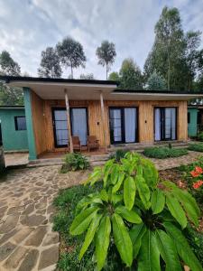 a guest house in a resort with plants at Khaya Nzuri 