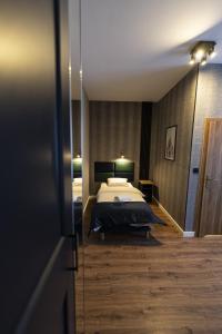 Posteľ alebo postele v izbe v ubytovaní Elegant Apartments