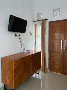 TV a/nebo společenská místnost v ubytování Kopi Bali House With Private Pool