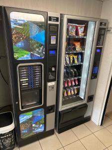 an atm machine with its door open with drinks at Premiere Classe Blois Nord in Blois