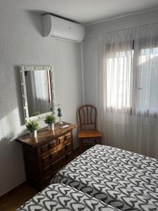 Posteľ alebo postele v izbe v ubytovaní Apartamento Urb Oasis Park II Denia, las Marinas