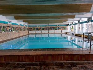 Swimmingpoolen hos eller tæt på Ferienwohnung Penthouse Wolke 16 mit Schwimmbad und Saunanutzung