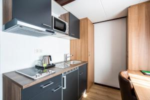 Een keuken of kitchenette bij Hotel Hulst