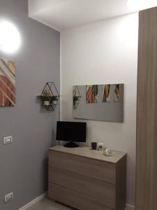 TV a/nebo společenská místnost v ubytování Rho Fiera Onit's Apartment