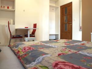 Posteľ alebo postele v izbe v ubytovaní Apartmani Nighty Night