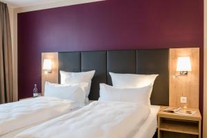 Postel nebo postele na pokoji v ubytování Die Post Hotel