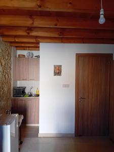 Kuchyň nebo kuchyňský kout v ubytování TRADITIONAL HOUSE ARSOS