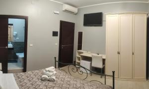 Postel nebo postele na pokoji v ubytování Guest House Elettra