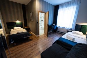 Posteľ alebo postele v izbe v ubytovaní Elegant Apartments