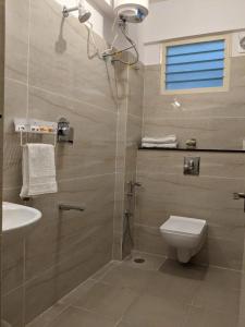 Kúpeľňa v ubytovaní Limelights Premium Serviced Residences