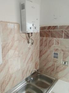 a sink in a bathroom with a counter top at Venus house15 in Raoued