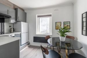 A cozinha ou cozinha compacta de Cosy Two Bedroom Apartment in Oxford Circus-Fitzrovia