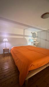 Ein Bett oder Betten in einem Zimmer der Unterkunft Apartamento Lu Maison